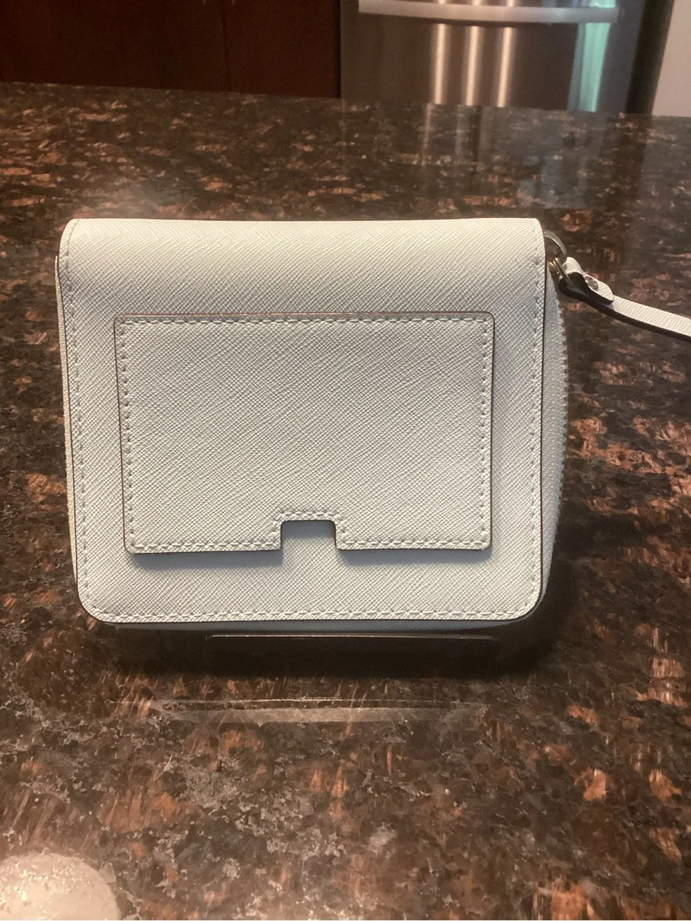 kate spade pale blue small flap wallet with gold plaque